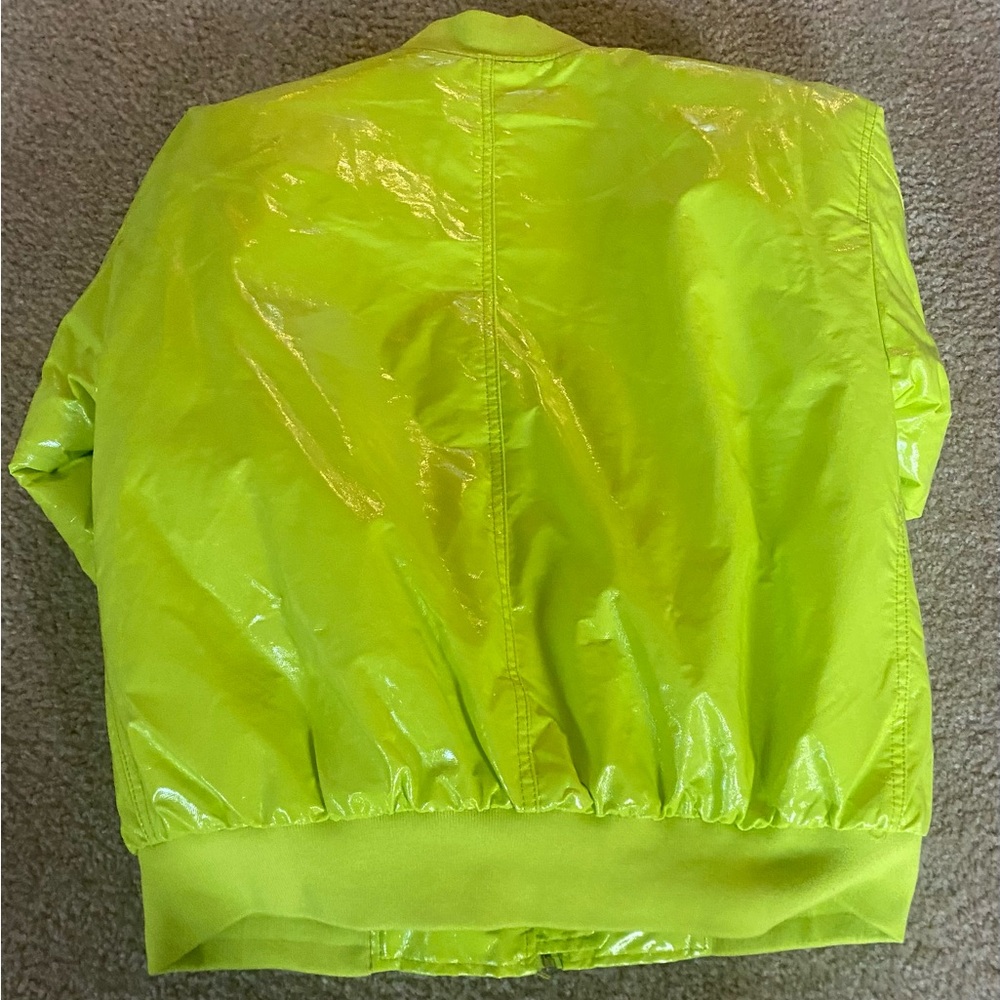 Lime green never worn plastic waist jacket Size Medium